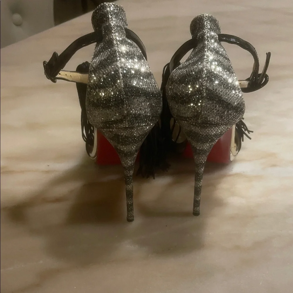 Christian Louboutin Silver Heels with Black Tassels - Picture 6 of 7